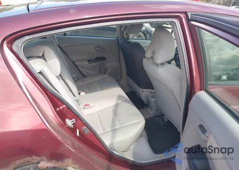 2011 Honda Insight from USA, damaged, VIN JHMZE2H37BS012364